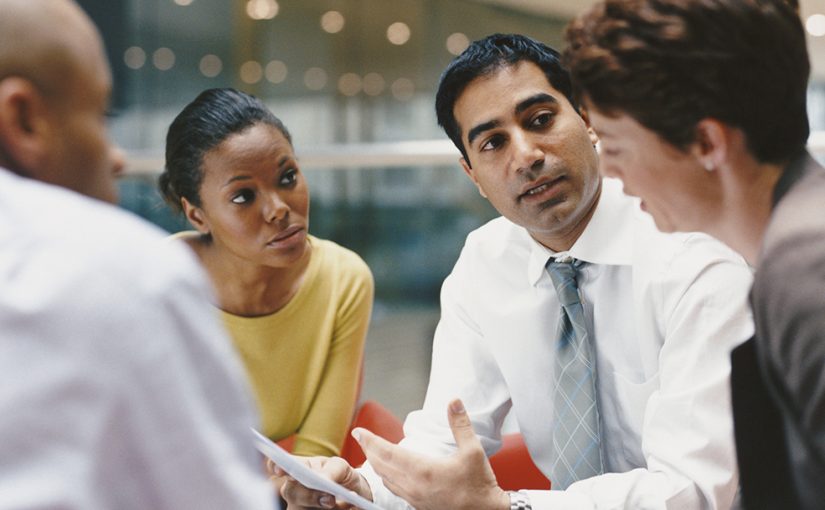 Marketing staff discussing goals